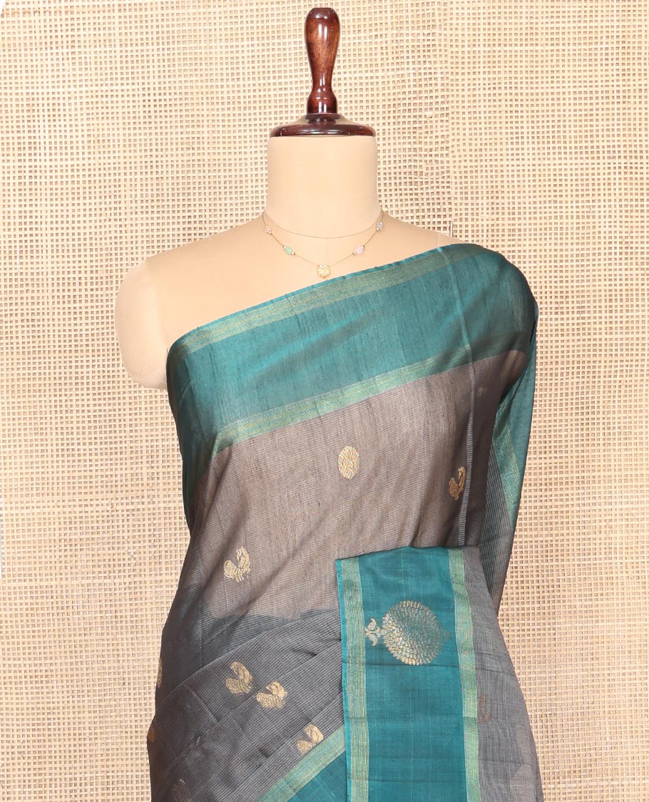 Grey Silk Cotton Saree, Adorned with Peacock and Rudraksha Buttas, Complemented by a Contrast Zari Buttas Border, Geometric Patterned Pallu, and a Contrast Blouse