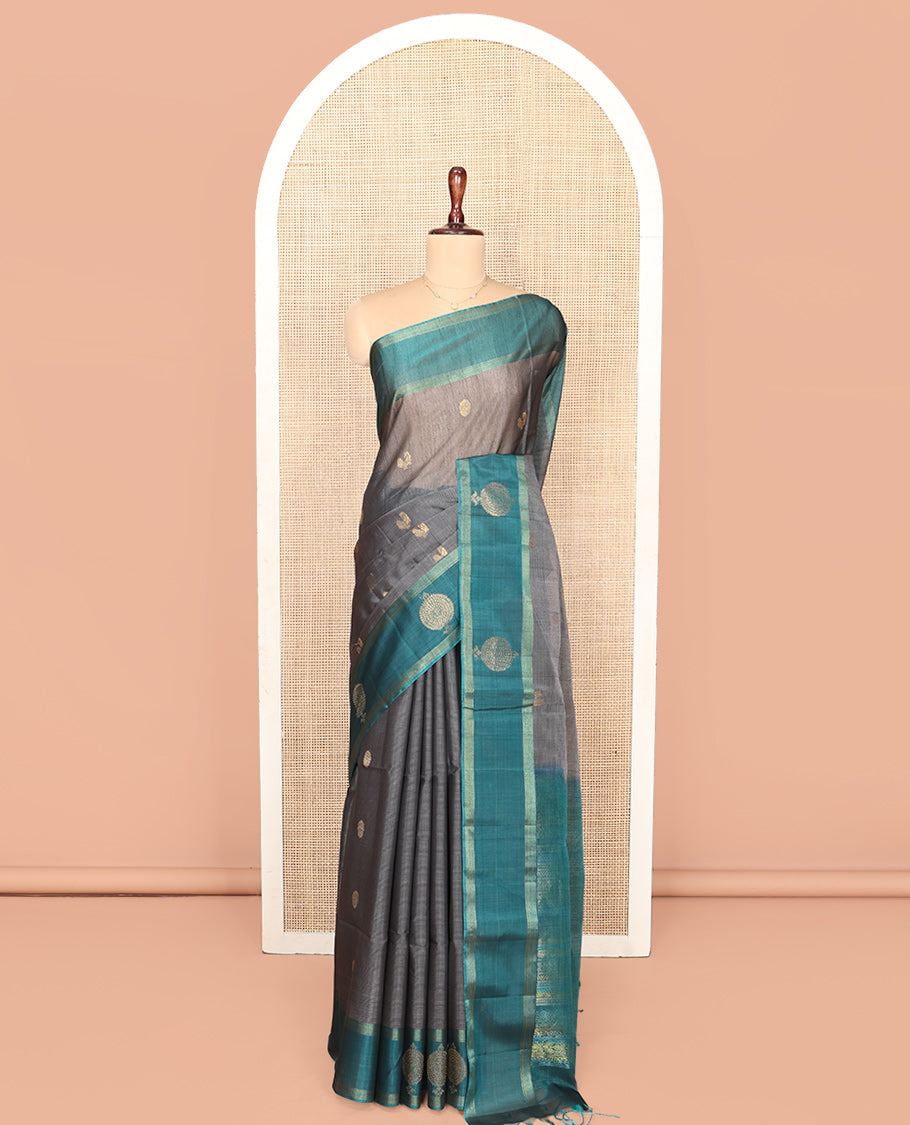 Grey Silk Cotton Saree, Adorned with Peacock and Rudraksha Buttas, Complemented by a Contrast Zari Buttas Border, Geometric Patterned Pallu, and a Contrast Blouse