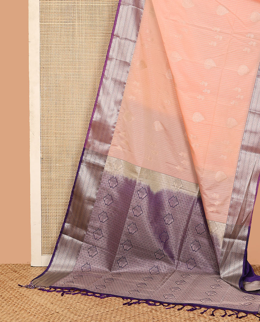 Peach zari design soft silk saree, contrast traditional zari design border, and a zari-rich jaal pallu