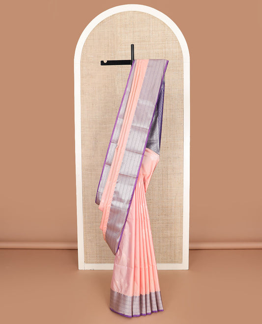 Peach zari design soft silk saree, contrast traditional zari design border, and a zari-rich jaal pallu