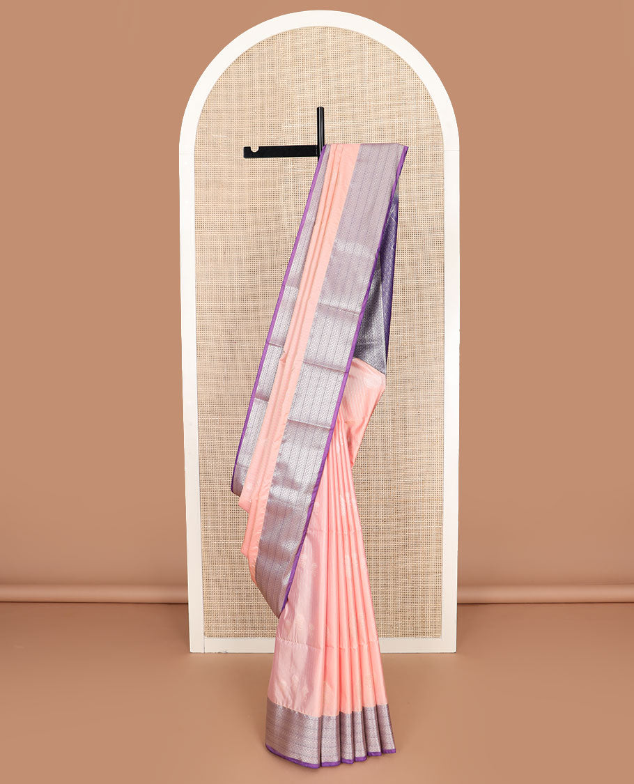 Peach zari design soft silk saree, contrast traditional zari design border, and a zari-rich jaal pallu