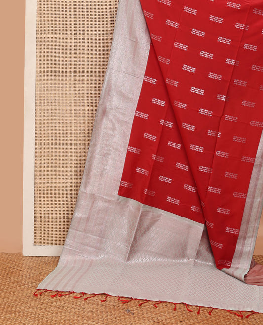 Red semi-soft silk saree with zari buttas, contrast gleaming zari border of geometric design & zari jaal pallu