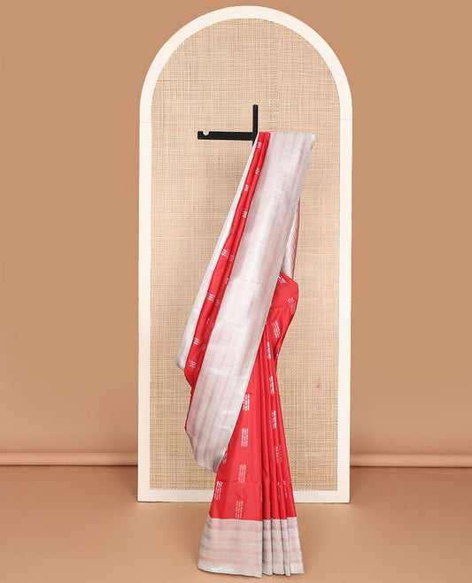 Red semi-soft silk saree with zari buttas, contrast gleaming zari border of geometric design & zari jaal pallu