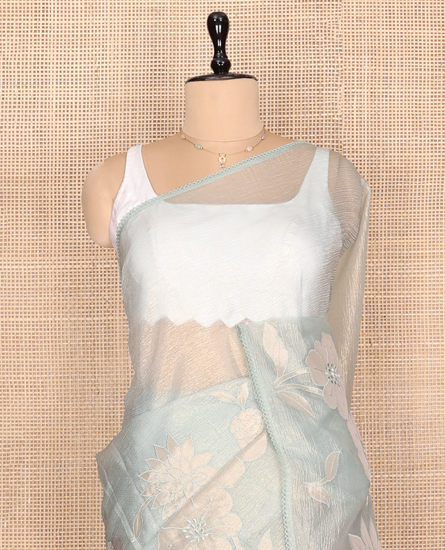 Pale Green Crushed Tissue Saree, Delicately Decked Up with Floral Motifs Embroidery, a Subtle Scallop Border, and Matching Blouse