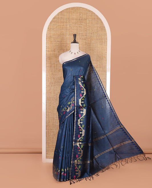 Navy blue multi-color buttas tussar silk saree, jamdani floral creeper border, and pallu of zari design