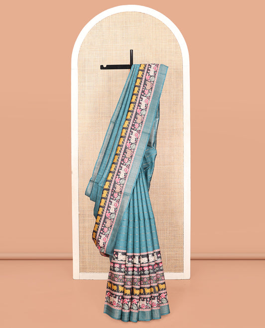 Blue Tussar Silk Saree, Sparsely Threaded with Stripes, Complemented by a Contrast Pichwai Cow-Lotus Print Border, Printed Pallu, and a Contrast Blouse