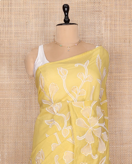 Yellow Fancy Tussar Saree, Artfully Detailed with Floral Vine Embroidery, a Subtle Scallop Border, and a Matching Blouse