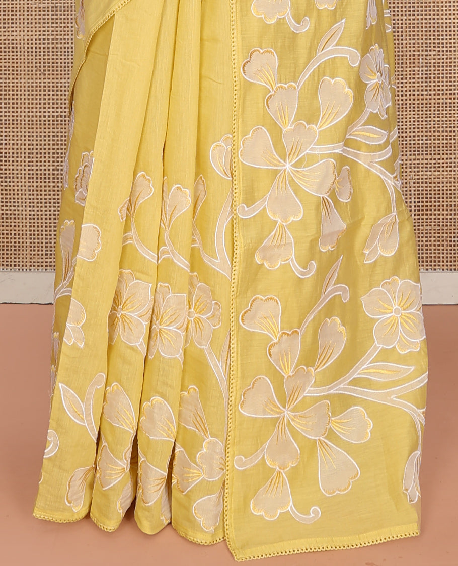 Yellow Fancy Tussar Saree, Artfully Detailed with Floral Vine Embroidery, a Subtle Scallop Border, and a Matching Blouse