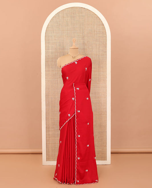 Red flower motifs embroidered designer saree, scallop embroidered border