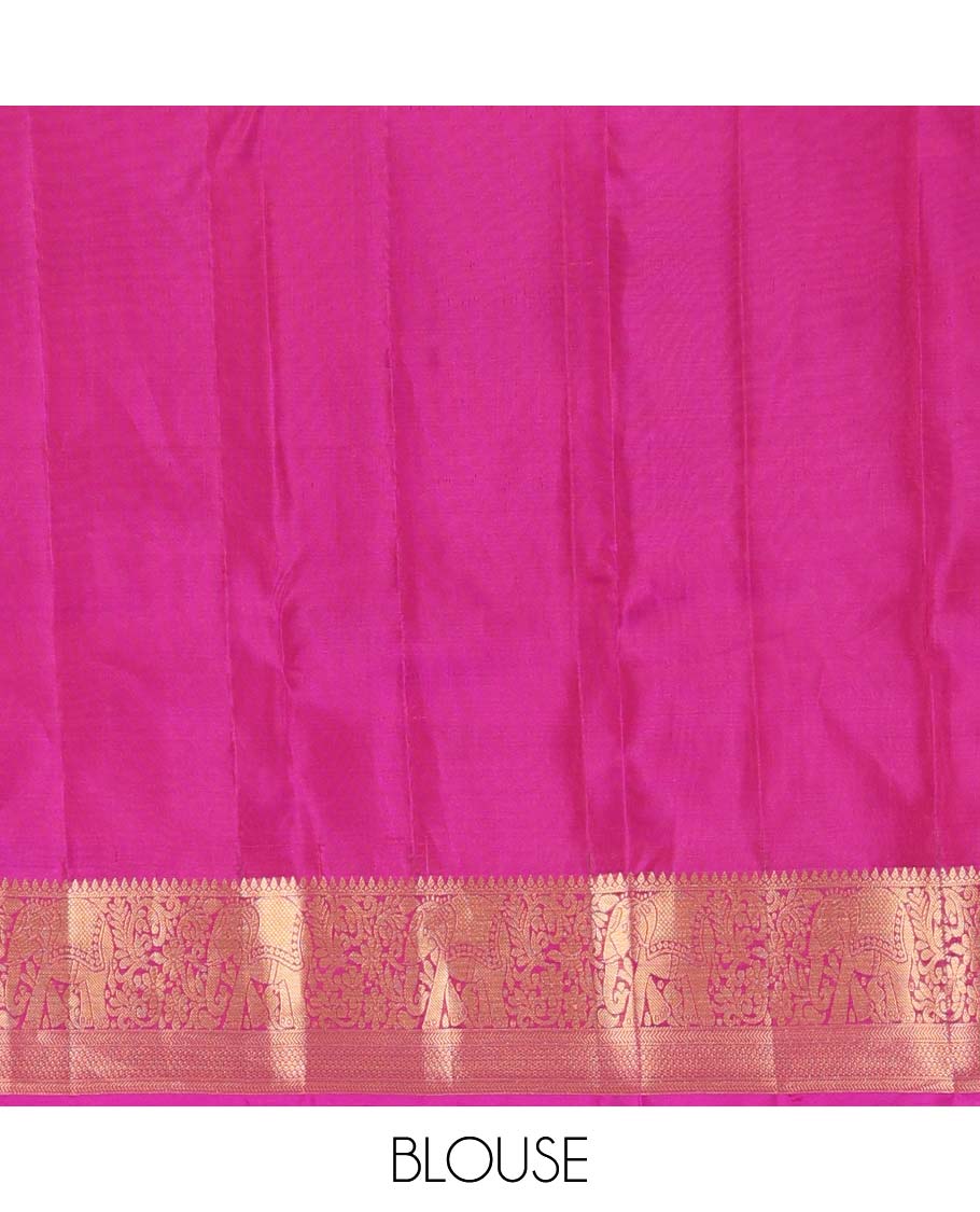 Orange zari buttas Vasundhara silk mix saree, contrast border of thilakam mokku, yaanai, kathir, and zari designs, and intricate pallu