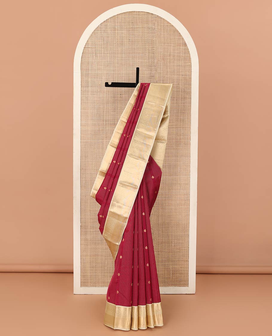Red stripes, and buttas Vasundhara silk mix saree, contrast border of rekku, muthu, rudraksham, and round mayil designs, and jaal pallu