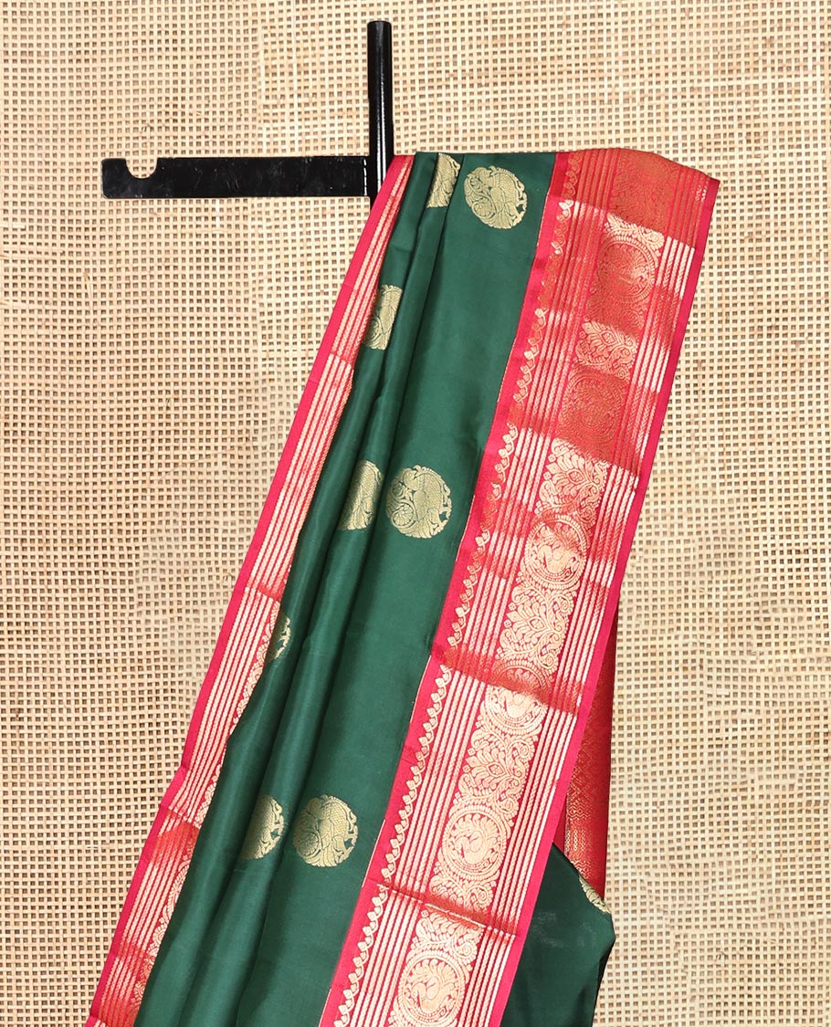 Green Vasundhara Lite Silk Mix Saree, Adorned with Mayil Buttas, a Contrast Border of Thilakam Mokku, Banaras, Kathir, and Mayil Designs, Jaal Pallu, and a Contrast Blouse