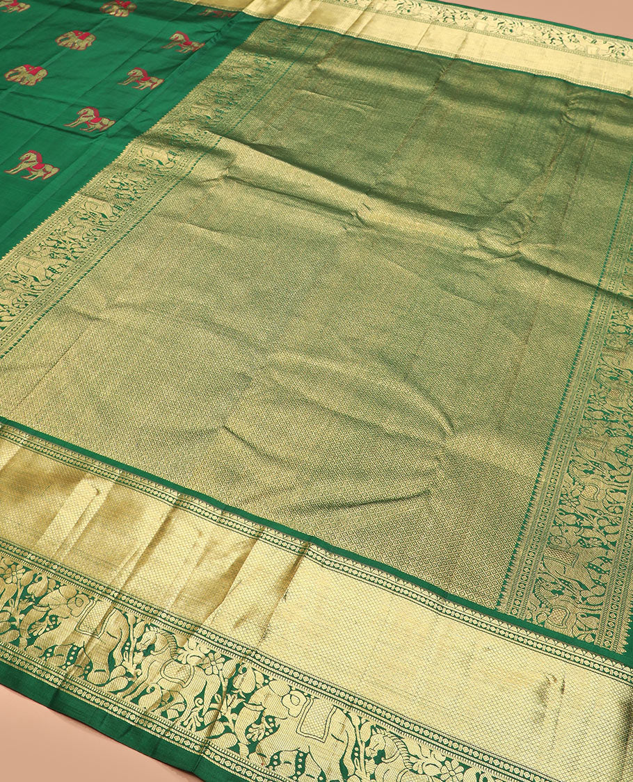 Green yaanai and kuthirai thread buttas silk saree, zari border of rekku, diamond, mayil kann, kuthirai, and yaanai designs, and jaal pallu
