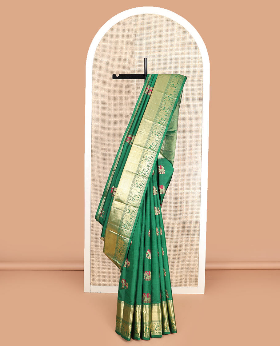 Green yaanai and kuthirai thread buttas silk saree, zari border of rekku, diamond, mayil kann, kuthirai, and yaanai designs, and jaal pallu