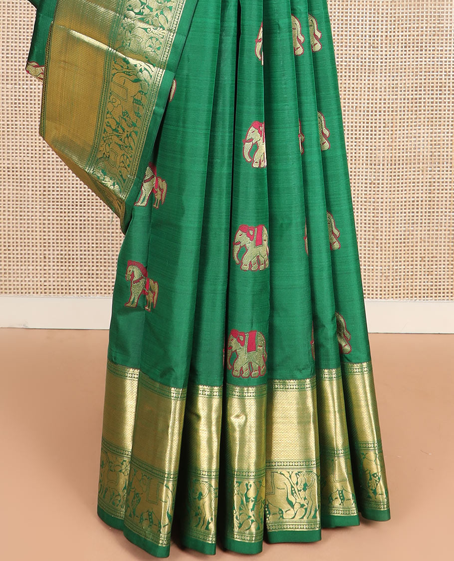 Green yaanai and kuthirai thread buttas silk saree, zari border of rekku, diamond, mayil kann, kuthirai, and yaanai designs, and jaal pallu