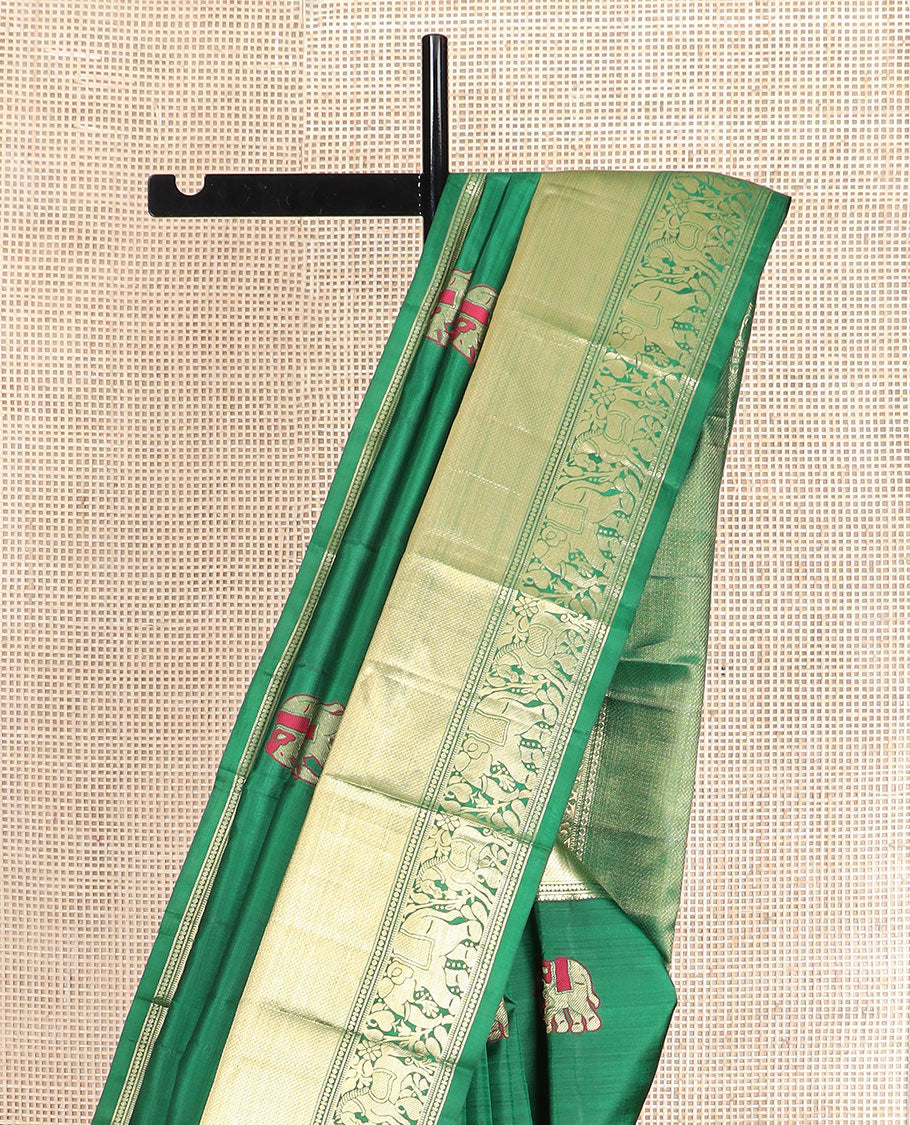 Green yaanai and kuthirai thread buttas silk saree, zari border of rekku, diamond, mayil kann, kuthirai, and yaanai designs, and jaal pallu