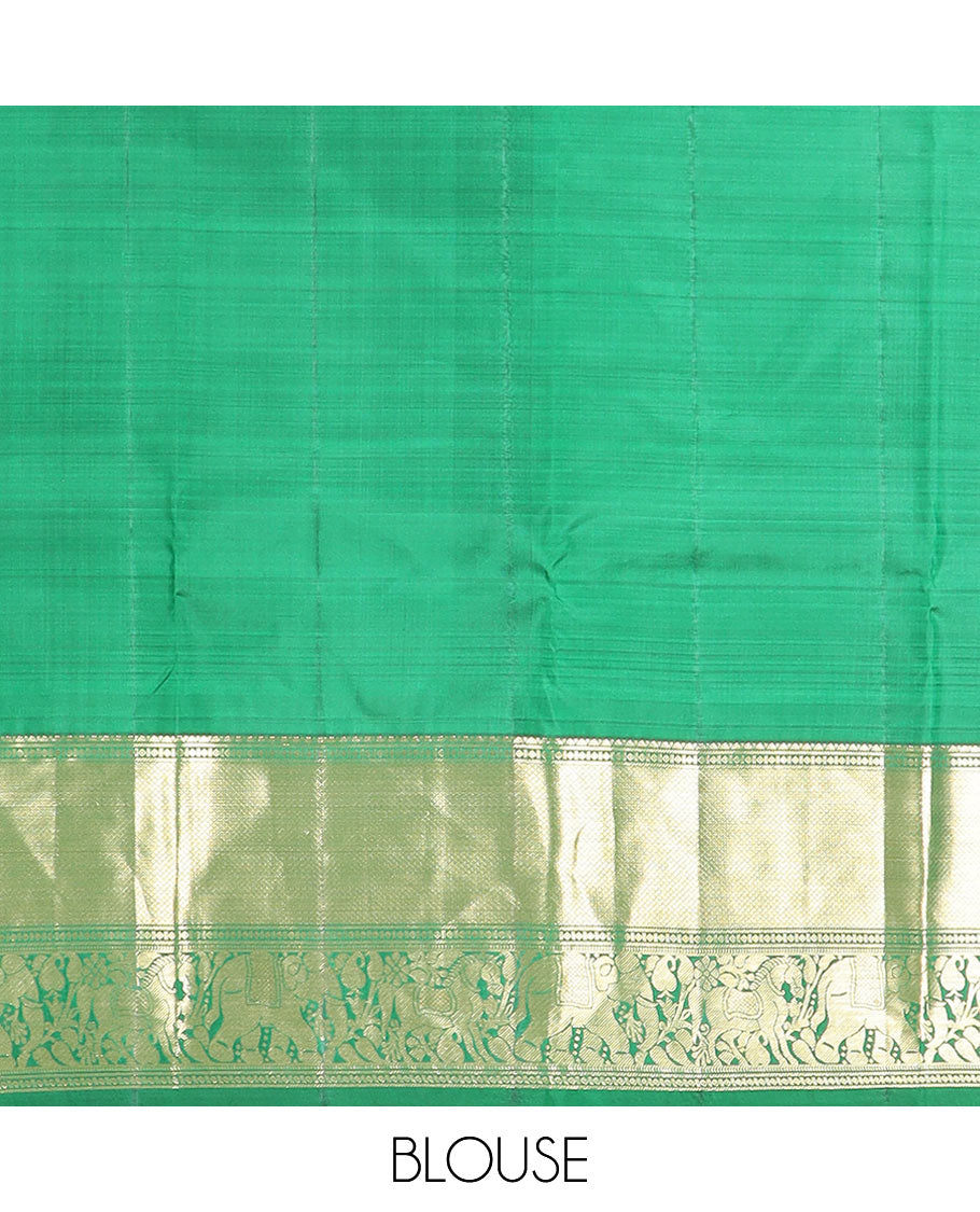 Green yaanai and kuthirai thread buttas silk saree, zari border of rekku, diamond, mayil kann, kuthirai, and yaanai designs, and jaal pallu