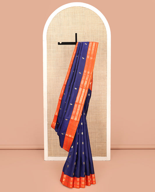 Blue Vasundhara Silk Saree, Enriched with Manga Buttas All Over Its Body, Complemented by Contrast Border of Mayil, and Yaanai Designs, Grand Pallu and Paired with a Contrast Blouse