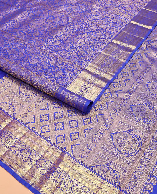Royal blue jacquard kanchipuram silk saree, zari border of thazampoo rekku, muthu, kathir, kuyil kann, and dhavana kodi designs, and intricate pallu