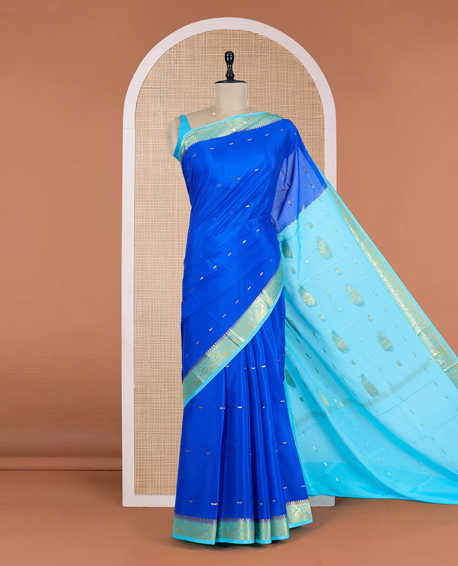 Royal Blue Mysore Silk Saree Adorned with Golden Zari Buttas, Featuring a Contrast Floral-Paisley Design Border, a Pallu Prettified with Zari Designs, and Paired with a Contrast Blouse