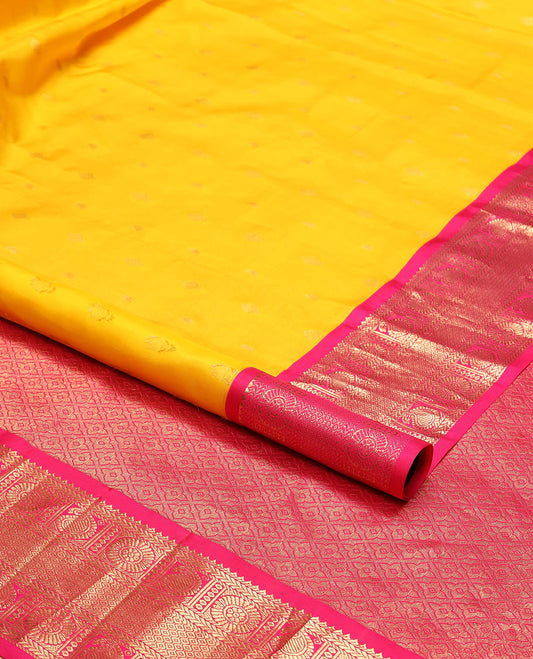 Yellow butta silk saree with contrast korvai zari design border & intricate zari design pallu