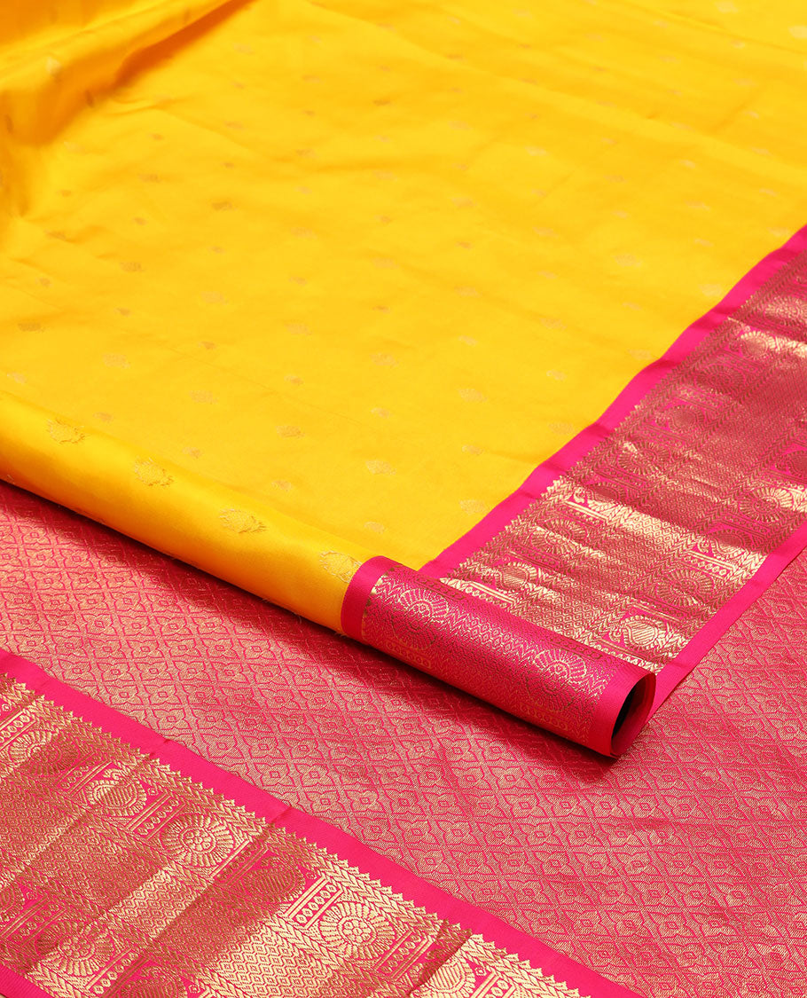 Yellow butta silk saree with contrast korvai zari design border & intricate zari design pallu