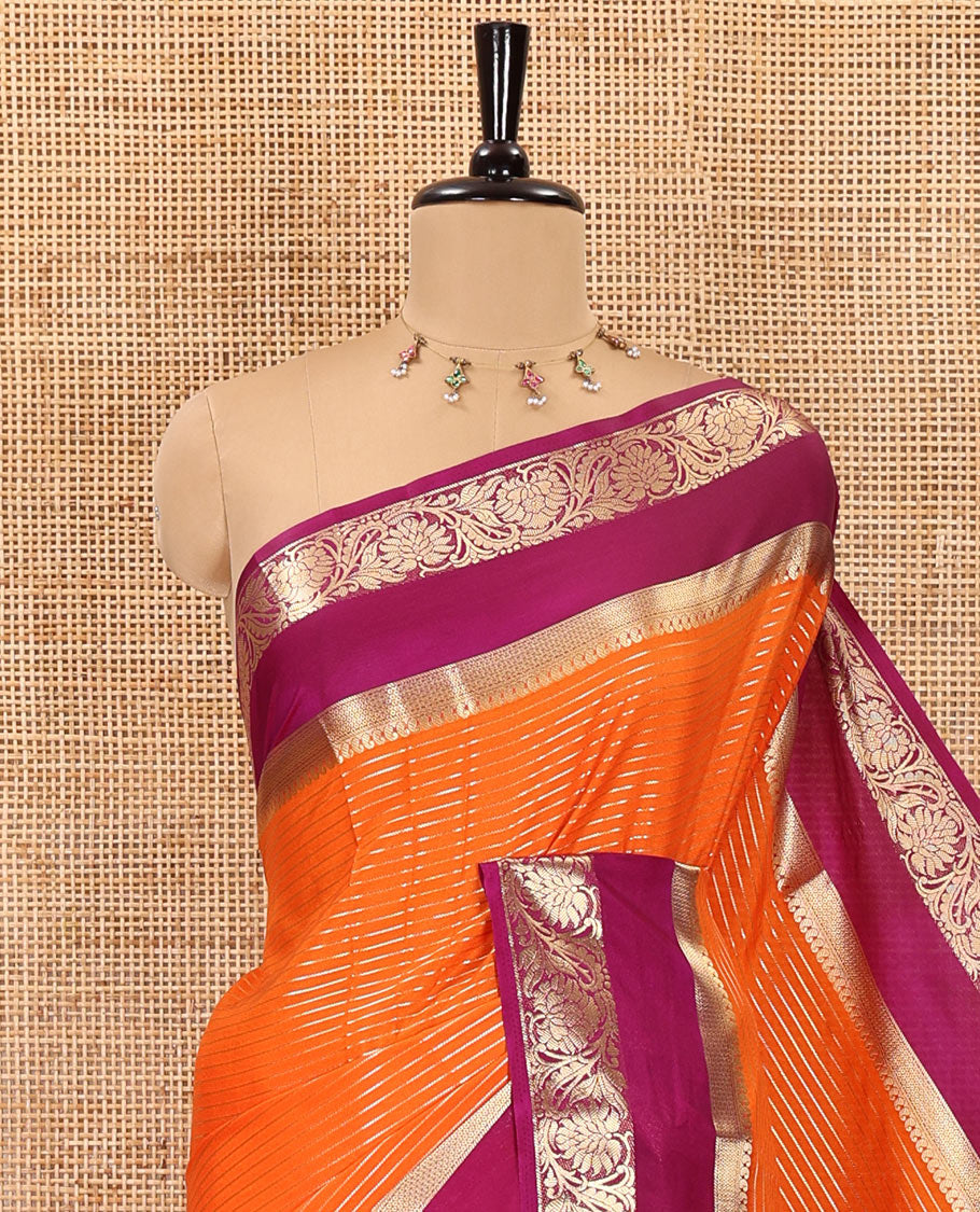 Orange gold zari horizontal striped art crepe saree, contrast rettai pettu, floral creeper zari border, zari design pallu, and a contrast zari design blouse