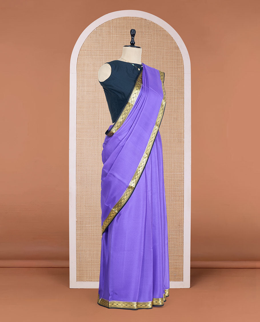 Lavender Plain Mysore Silk Saree, Complemented by a Contrast Zari Border of Traditional Designs, a Pallu Gleamed Up with Zari Stripes, and a Contrast Blouse