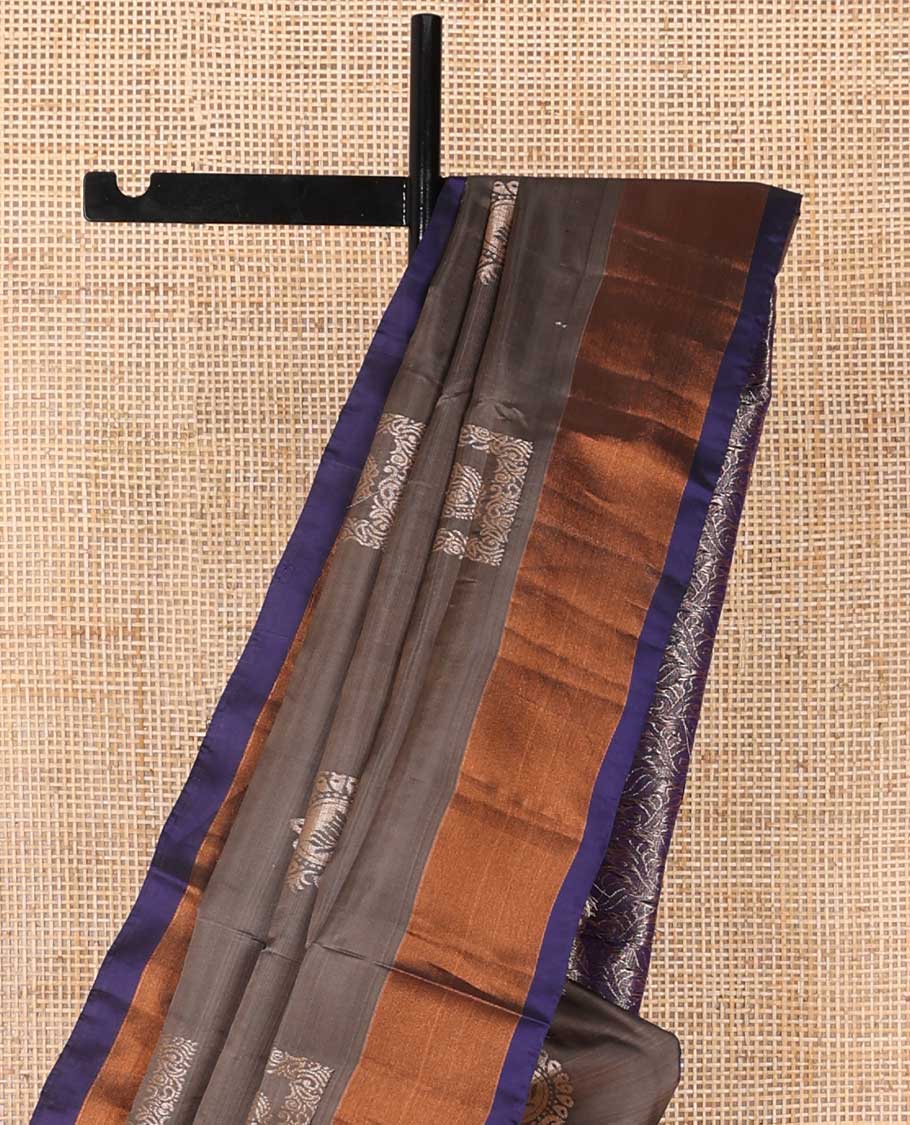 Brown floral motifs uppada saree with contrast zari border & floral design pallu