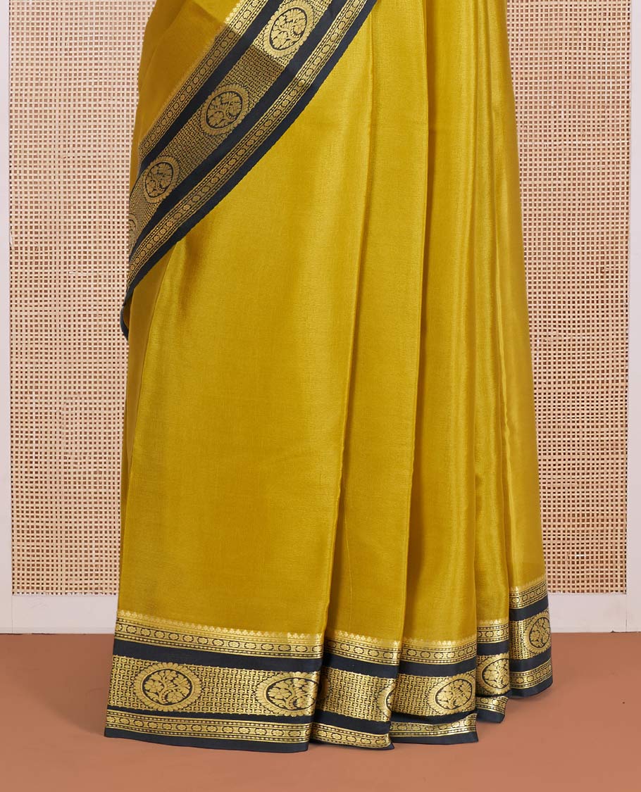 Mustrad Plain Mysore Silk Saree, Complemented by a Contrast Traditional Zari Design Border, a Pallu Gleamed Up with Zari Stripes, and a Contrast Blouse