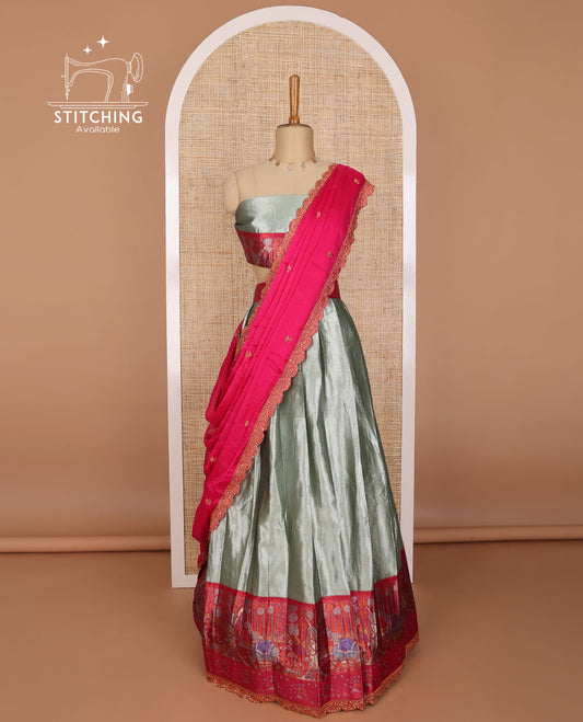 Grey tissue half saree with contrast floral, elephant design border, floral design blouse & floral embroidery, scallop border dhavani