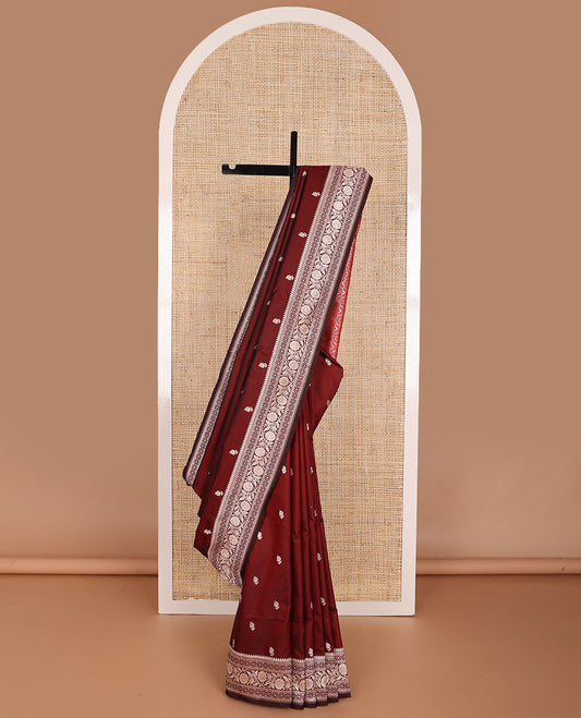 Maroon motifs banaras silk saree with self floral design border & argyle design pallu