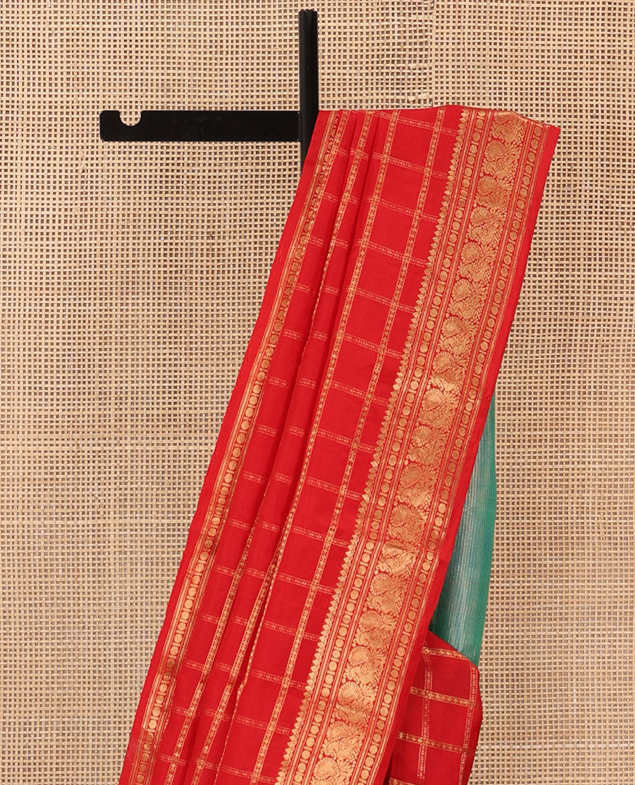 Dazzling red thick zari checked Kanchipuram silk saree, zari border of thilakam mokku, rudraksham, and Mayil, and contrast gleaming zari seer pallu