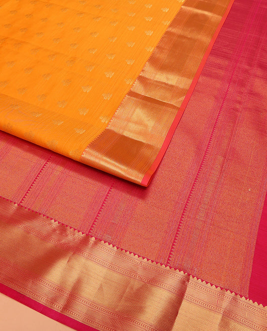 Orange Vasundhara Lite Silk Mix Saree Adorned with Floral Zari Buttas, Highlighted with Contrast Border Featuring Rekku, Muthu, Kathir, and Zari Stripes, Zari Elevated Pallu, and Attached with a Matching Blouse
