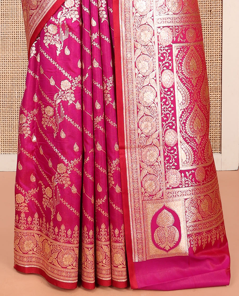 Rani Pink Banarasi Nylon Saree, Opulently Embellished with Zari Designs, Highlighted by a Traditional Zari Border, Intricate Pallu, and a Matching Blouse