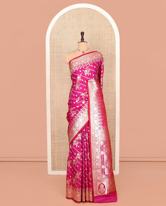 Rani Pink Banarasi Nylon Saree, Opulently Embellished with Zari Designs, Highlighted by a Traditional Zari Border, Intricate Pallu, and a Matching Blouse