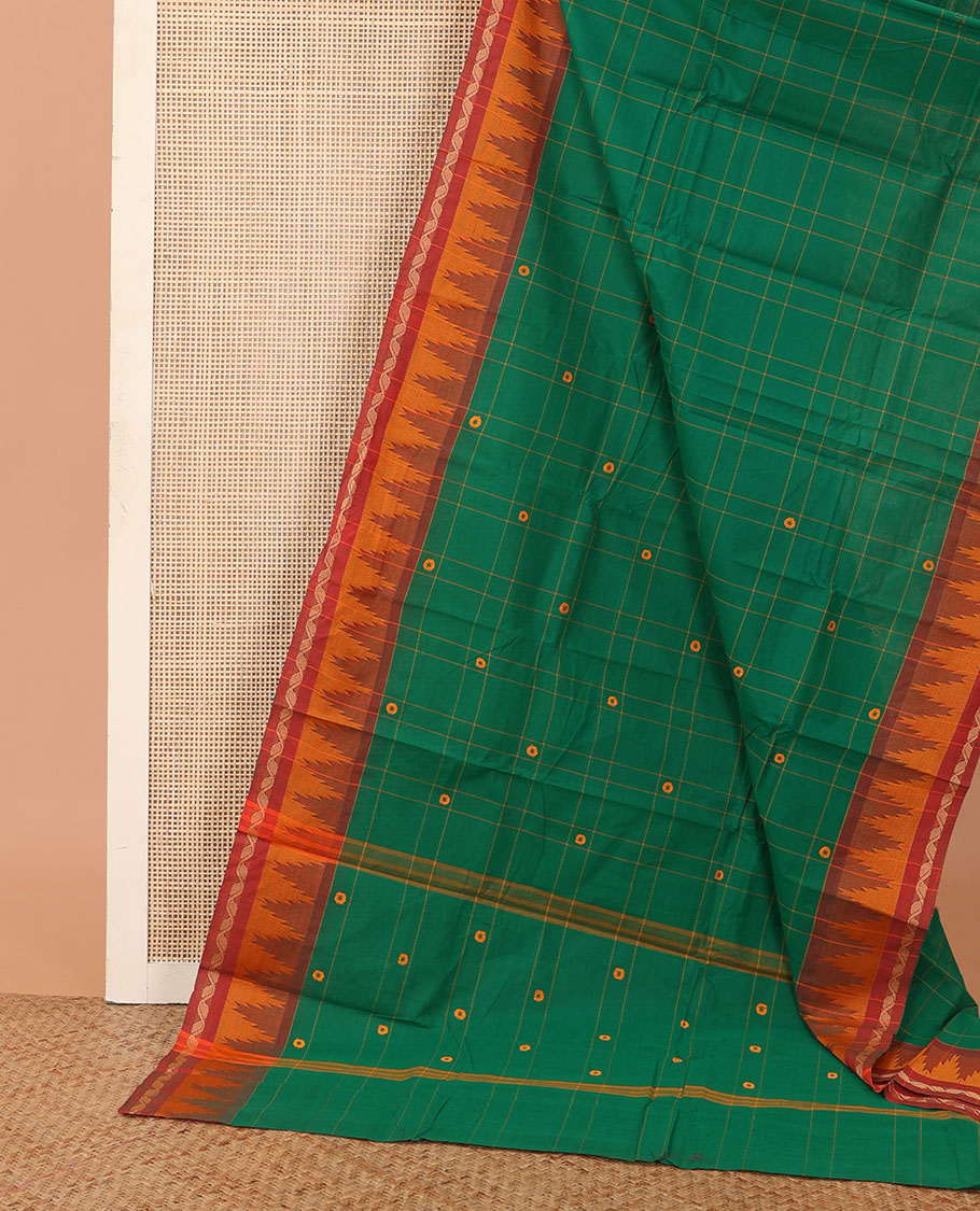 Green buttas and checked Chettinad cotton saree, contrast temple border, and pallu of buttas