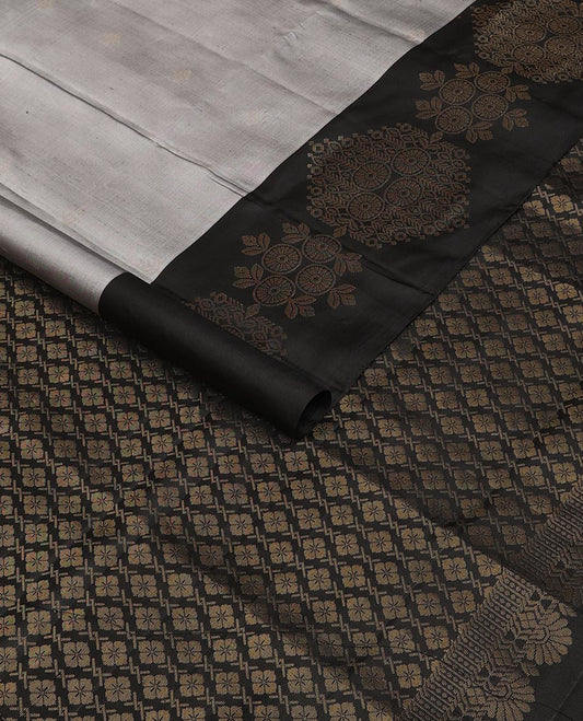 Grey zari buttas soft silk saree, contrast chakram motifs border & floral jaal pallu