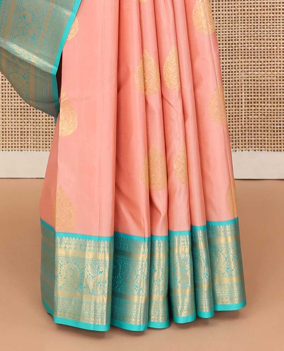 Peach thilakam buttas silk saree, contrast border of thilakam,muthu,poun, and mayil, and pallu of jaal design