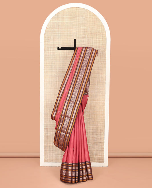 Pink Vasundhara Silk Saree, Embellished with Mayil and Chakram Buttas All Over Its Body, Complemented by a Contrast Border of Thilakam, Neli, Laddu Kamalam, and Kodi Visiry Designs, Grand Pallu of Butta Enclosed Checks, and Paired with a Contrast Blouse