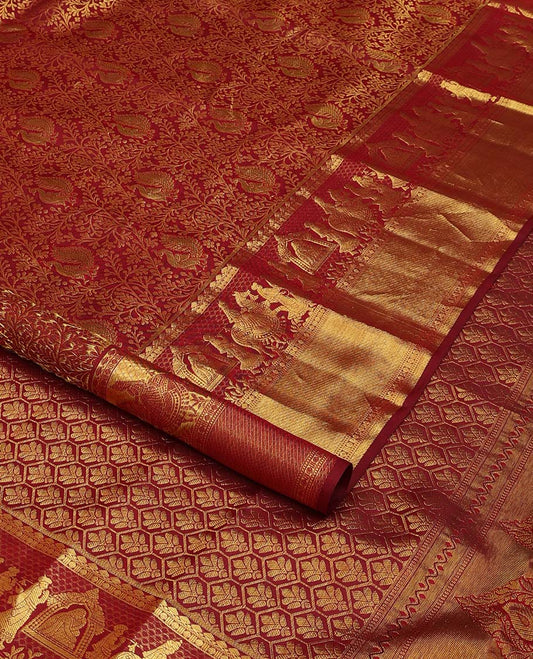 Maroon jacquard wedding silk saree, traditional zari border of wedding palanquin design, and butta enclosed hexogon grid pallu