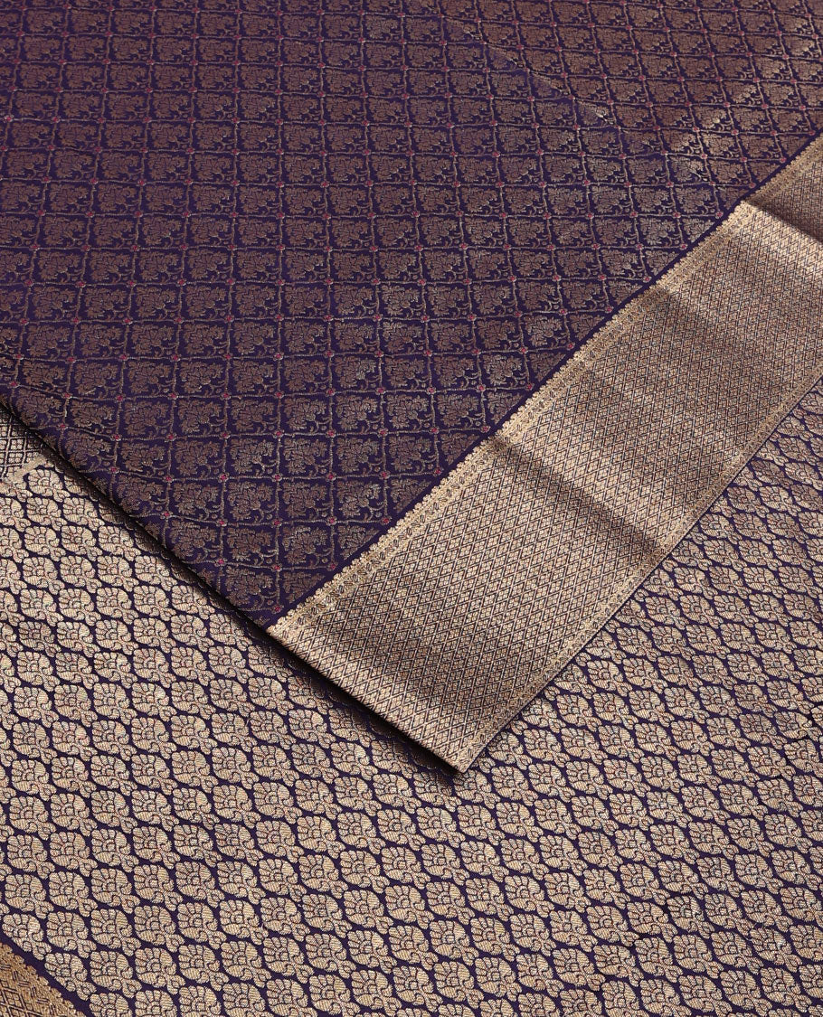 Blue jacquard satin silk saree, zari jaal patterned border, and intricate pallu