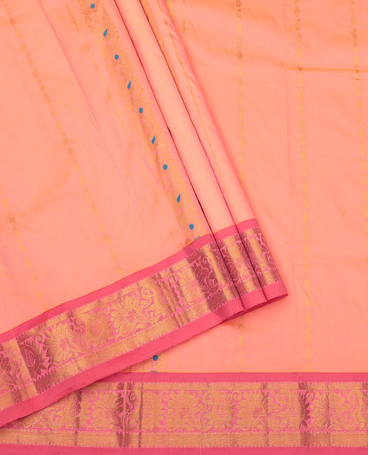 Peach Art Silk Pavadai Material Set, Decked Up with Zari Designs on Its Skirt, Complemented by a Contrast Traditional Zari Border, and a Matching Blouse