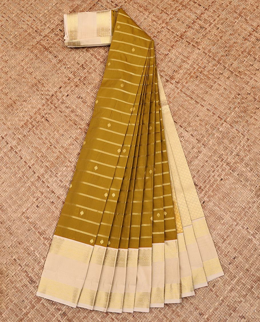 Green Budget Silk Saree, Detailed with Zari Buttas and Stripes All Over Its Body, Complemented by a Contrast Zari Border of Traditional Designs, Pallu of Subtle Jaal Design, and Paired with a Contrast Blouse