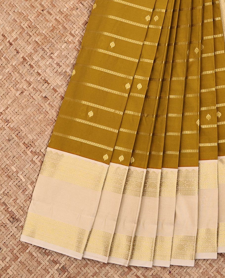 Green Budget Silk Saree, Detailed with Zari Buttas and Stripes All Over Its Body, Complemented by a Contrast Zari Border of Traditional Designs, Pallu of Subtle Jaal Design, and Paired with a Contrast Blouse