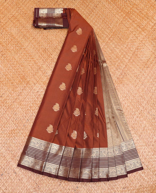 Honey Color Budget Silk Saree, Elevated with Jhumka Buttas All Over Its Body, Complemented by Captivating Contrast Traditional Zari Designs Woven Border, Grand Jaal Pallu, and Paired with a Contrast Blouse