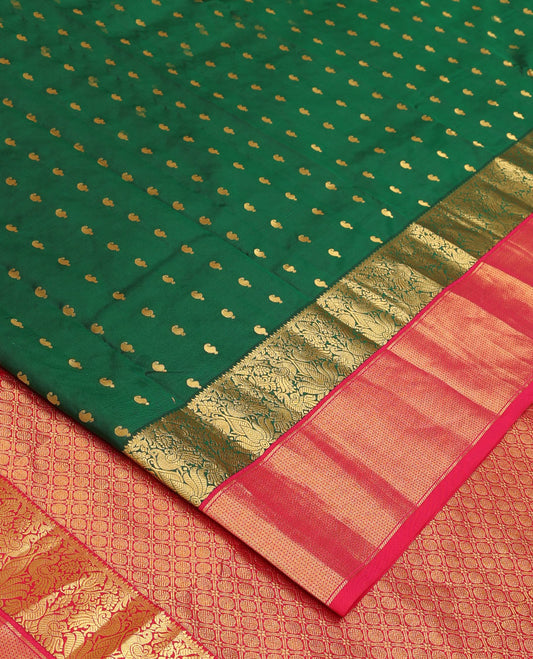 Green paisley zari buttas Bangalore silk saree, contrast zari border of peacock designs, and pallu of ogee patterns