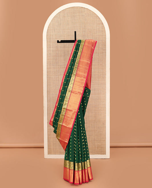 Green paisley zari buttas Bangalore silk saree, contrast zari border of peacock designs, and pallu of ogee patterns