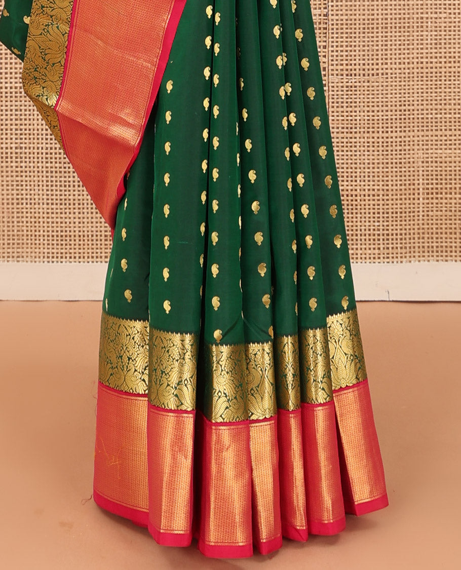 Green paisley zari buttas Bangalore silk saree, contrast zari border of peacock designs, and pallu of ogee patterns