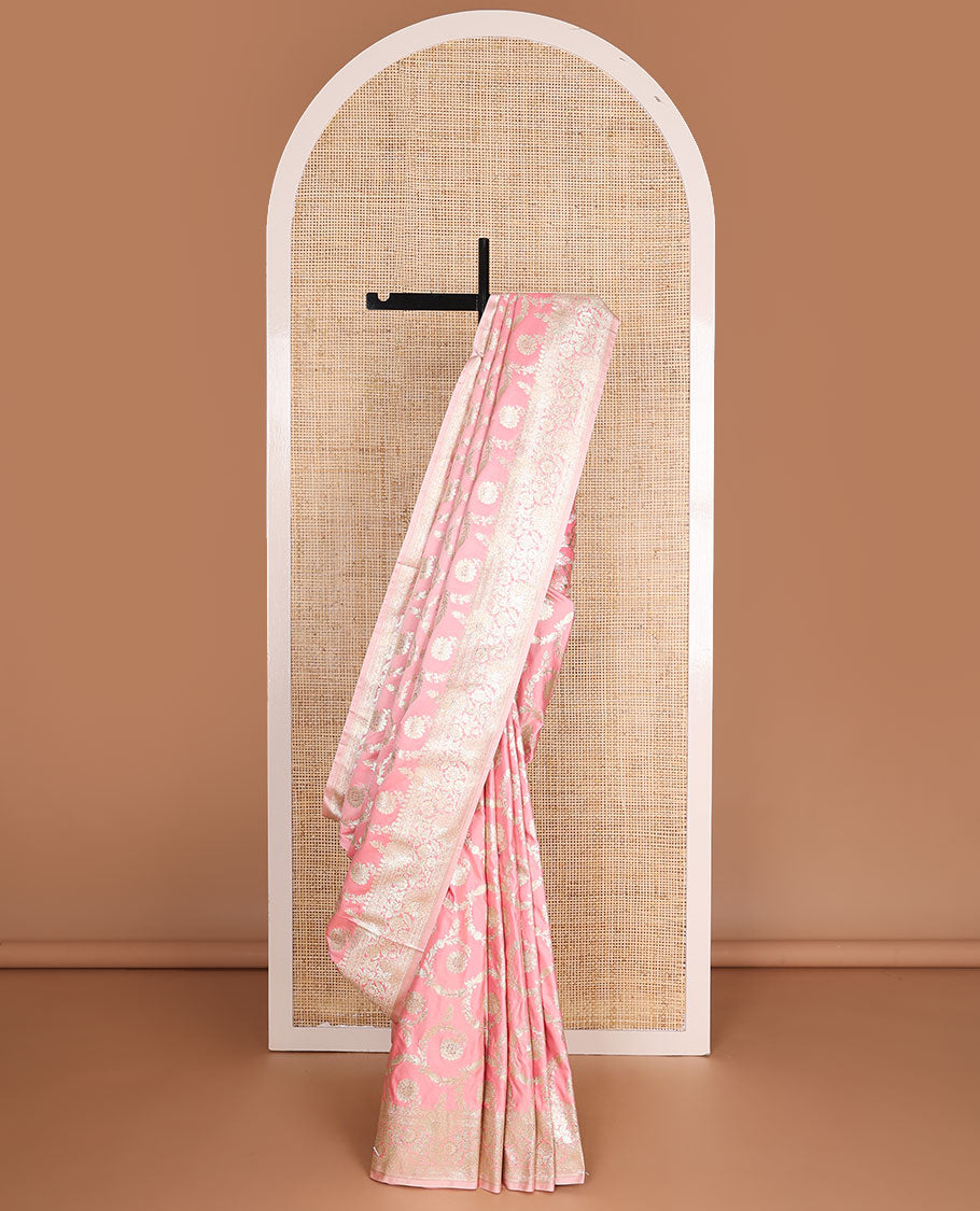 Pink floral jacquard semi banaras satin , self-border of floral creeper designs & zari-rich pallu of intricate floral designs